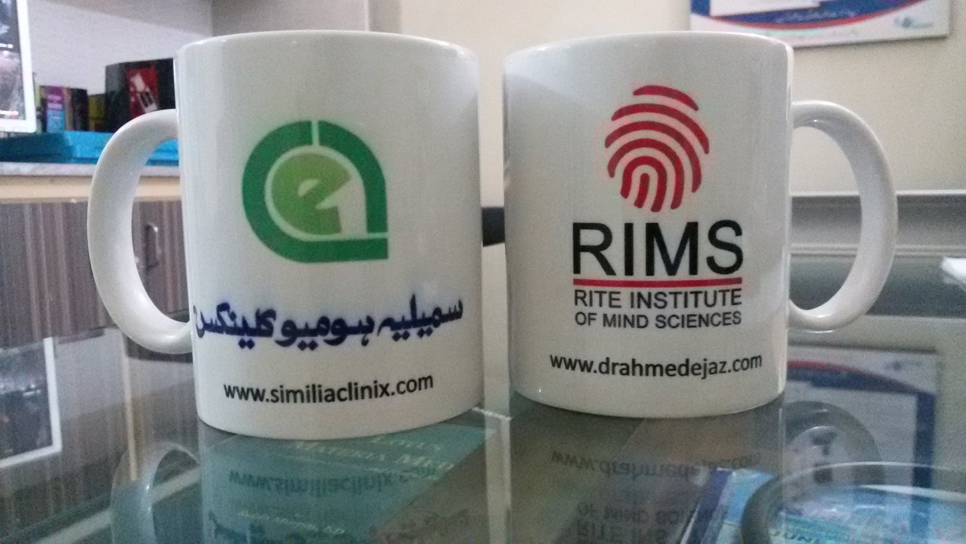 Similia Homoeo Clinix and RIMS branded mugs